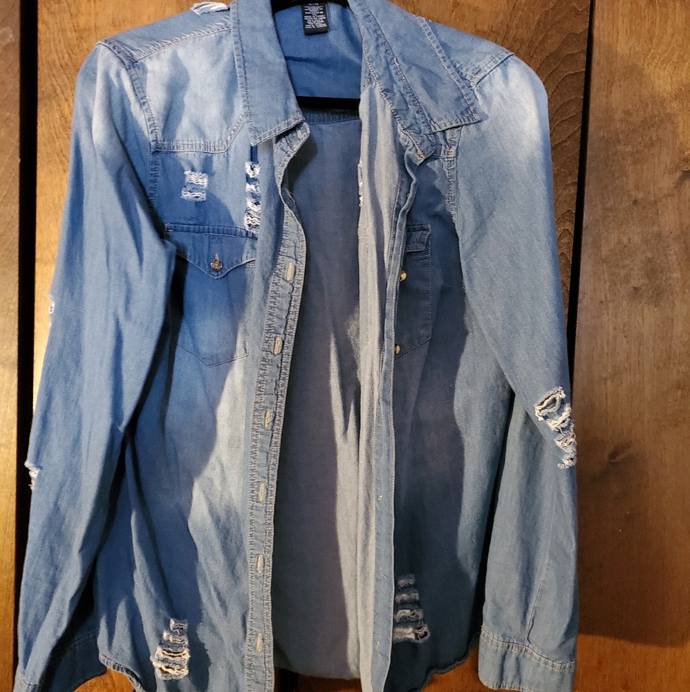 Ripped denim shirt